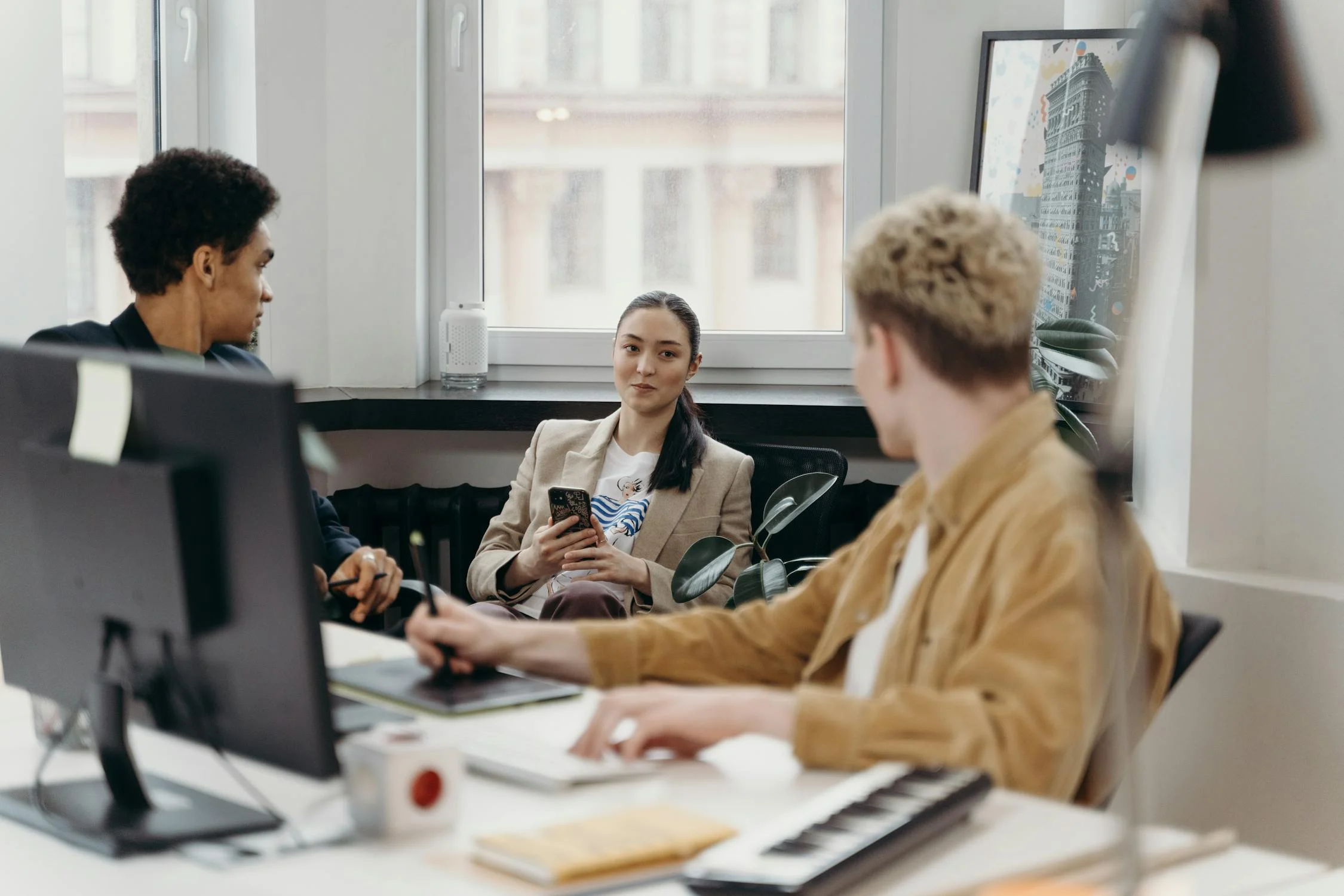 Diverse group of professionals collaborating in a modern office setting